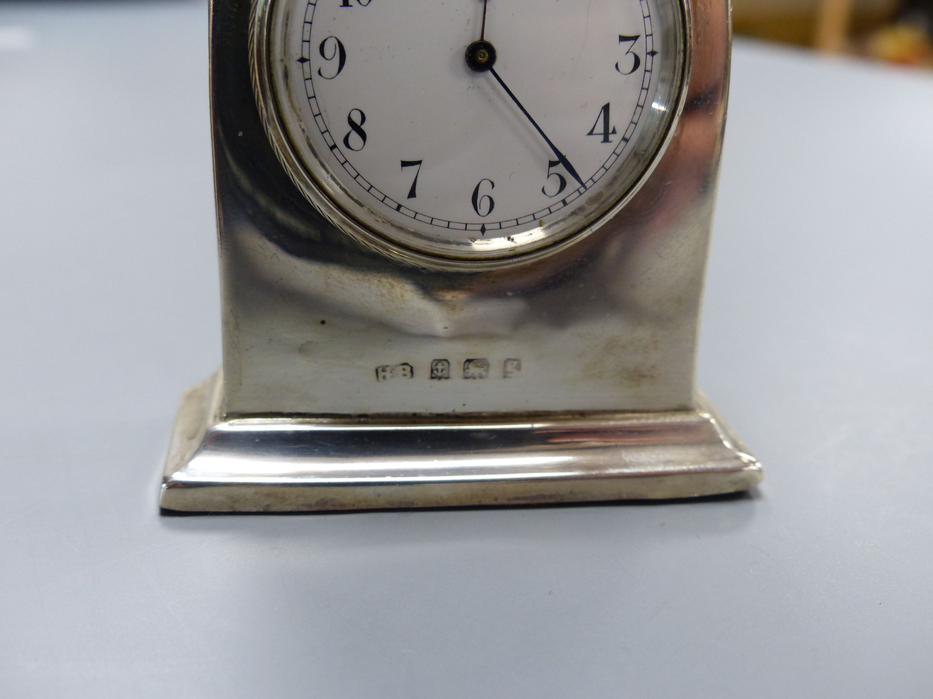 An Edwardian silver mounted lancet miniature timepiece, Birmingham, 1906, 71mm.